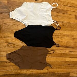 3 bodysuits